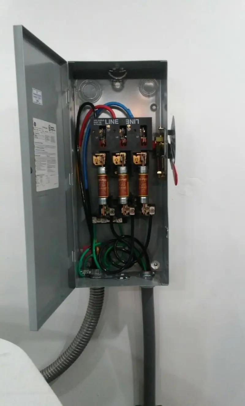 Three-phase disconnect switch installed for Smoke Detector Installation in Wales